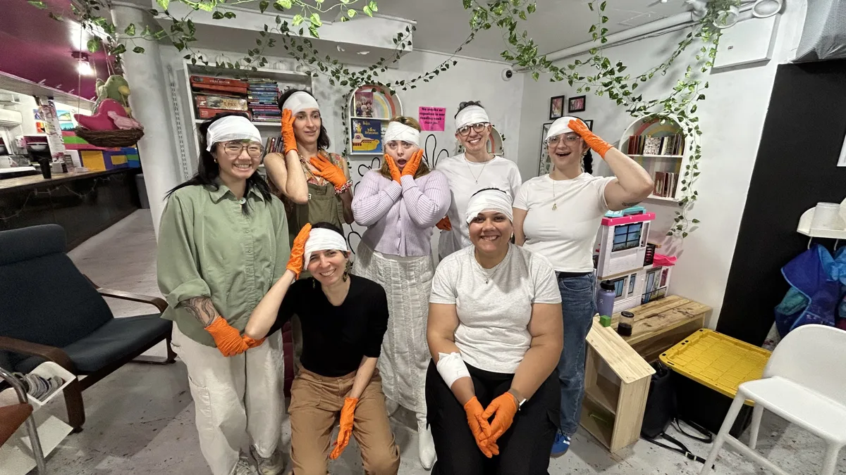 EXO team members volunteering alongside community partners